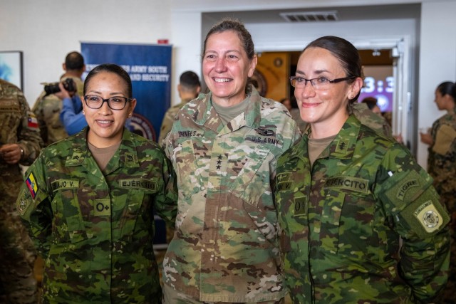 Lt. Gen. Jody Daniels, Chief of the Army Reserve & Commanding General, U.S. Army Reserve, poses for a photo with two Ecuadorian soldiers attending the inaugural Army South Women, Peace, and Security Symposium at San Antonio, Texas on Feb. 22 and 23. This symposium included presentations, panel discussions, and question and answer sessions supporting the Women, Peace, and Security initiative. The United Nations Women, Peace, and Security initiative is designed to educate, advocate for, and expand the roles women play in national security and defense strategy throughout the globe.