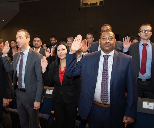 APG Senior Leadership Cohort 14 and civilians reaffirm their oath of office,