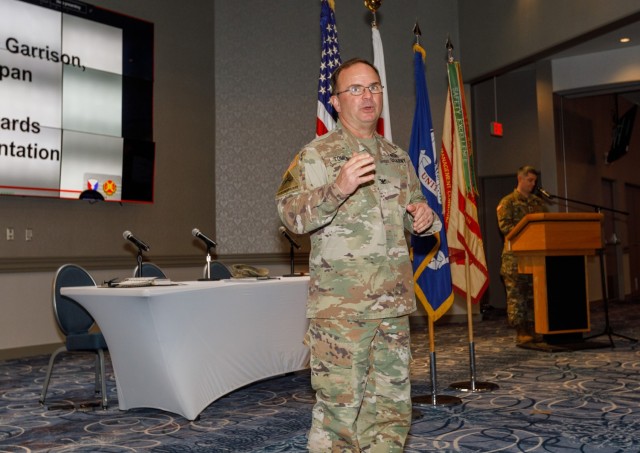 Col. Christopher L. Tomlinson, commander of U.S. Army Garrison Japan, speaks during a workforce town hall inside the Camp Zama Community Club, March 1, 2023.