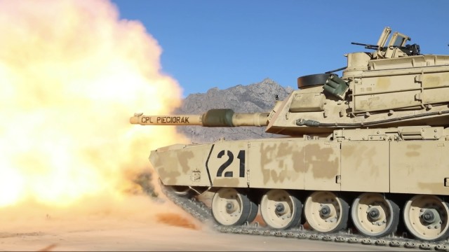 An M1 Abrams Tank fires at targets for gunnery shortly after christening their barrel with a new name, CPL Pieciorak. Thaddeus Pieciorak is a former 1st Armored Division Soldier who served in the European Theater of World War II. The barrel was given his namesake in celebration of his 100th birthday on March 3, 2023.