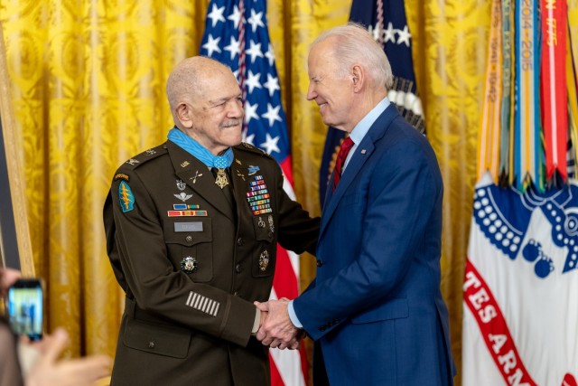 President Joe Biden participates in the Medal of Honor ceremony for Retired U.S. Army Col. Paris D. Davis, Friday, March 3, 2023, in the East Room of the White House. 