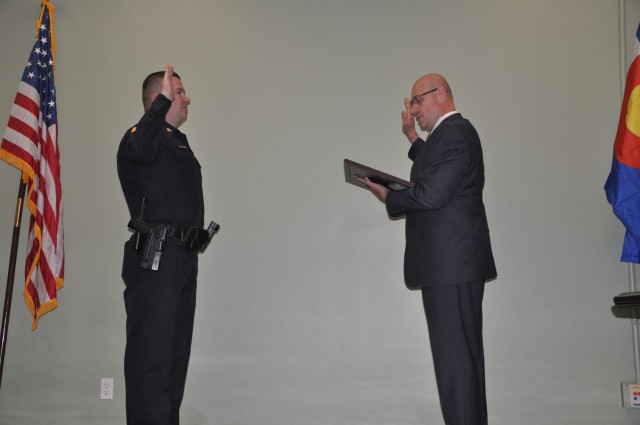 Fort Carson, Colo. –  Ricky Oxendine, deputy director of emergency services, swore in Brandon Graber as the new Chief of Fort Carson Police March. 1 at Fort Carson Police Station. He has been at Fort Carson since December 2002. 
