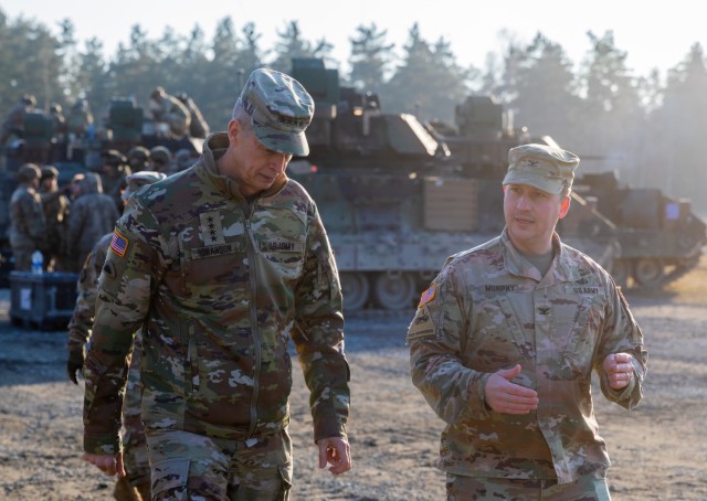 U.S. Army Gen. Daniel Hokanson, chief of the National Guard Bureau, speaks with Col. William Murphy, commander of Task Force Orion, 27th Infantry Brigade Combat Team, New York Army National Guard, at a training site for the M2 Bradley Fighting...