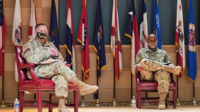 From left, APG Garrison Commander Col. Timothy Druell and APG Senior Commander Maj. Gen. Mitchell Kilgo deliver remarks during an installation town hall Thursday, March 11, at the Myer Auditorium.