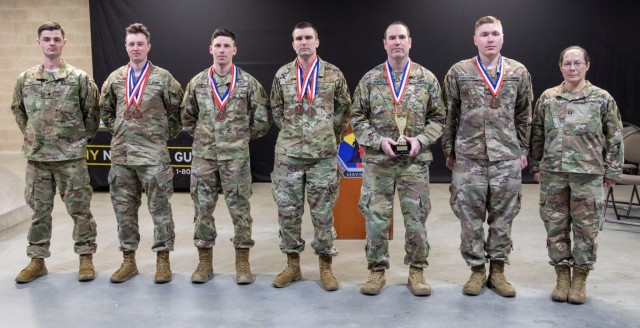 Members of the New Hampshire National Guard’s biathlon team pose for a photo after winning third place in the 2023 Chief of the National Guard Bureau’s Biathlon Championships at the Camp Ethan Allen Training Site in Jericho, Vt., Feb. 22. From left, U.S. Army Spc. Jimmy Small, U.S. Army 2nd Lt. Bryce Murdick, U.S. Army Spc. Tom Echelberger, U.S. Air Force Staff Sgt. Christopher Parent, U.S. Army Maj. Rob Burnham, U.S. Army Staff Sgt. Jacob Englehardt, U.S. Army Capt. Pamela Donley. (Courtesy photo)
