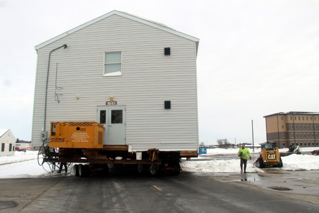 History made: Contractor moves first two World War II-era barracks at Fort McCoy