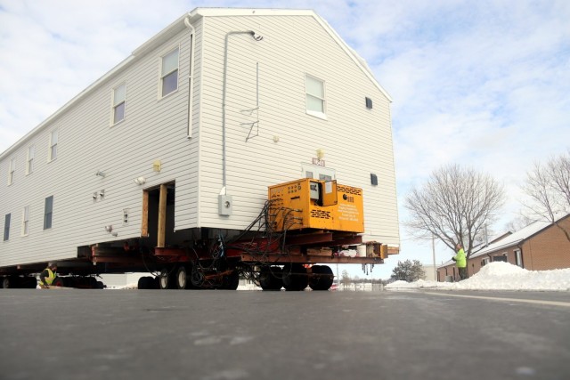 History made: Contractor moves first two World War II-era barracks at Fort McCoy