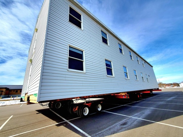 History made: Contractor moves first two World War II-era barracks at Fort McCoy