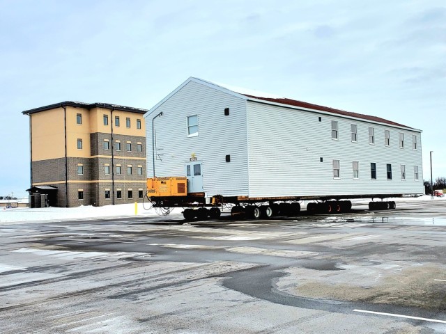 History made: Contractor moves first two World War II-era barracks at Fort McCoy