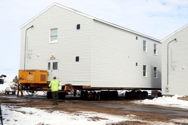 History made: Contractor moves first two World War II-era barracks at Fort McCoy