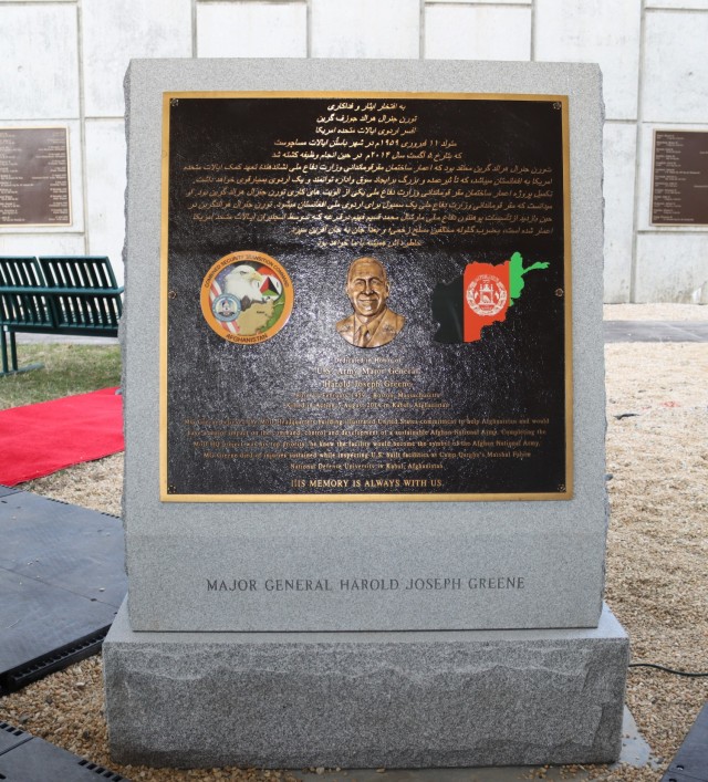 A memorial plaque for Maj. Gen. Harold Greene mounted on a large stone featuring his likeness, a seal from his final unit and words about his service and commitment written in both Dari and English at a rededication ceremony held March 9.   The plaque reads “MG Greene believe the Minister of Defense Headquarters building illustrated United States commitment to help Afghanistan and would have a major impact on the command, control and development of a sustainable Afghan National Army. Completing the MOD HQ project was his top priority; he knew the facility would become the symbol of the Afghan National Army. MG Greene died of injuries sustained while inspecting U.S. built facilities at Camp Qargha’s Marshal Fahim National Defense University in Kabul, Afghanistan. HIS MEMORY IS ALWAYS WITH US.”