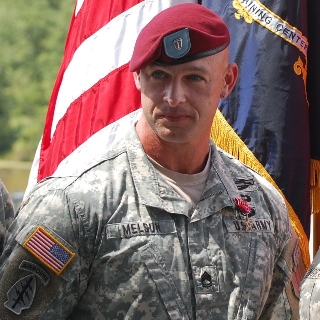 First Sgt. John Melson, then a Sgt. 1st Class and member of the Massachusetts Army National Guard, was presented the Bronze Star Medal with &#34;V&#34; device for valor at Fort Benning, Ga., Aug. 23, 2013, for his actions in 2009 while fighting off a Taliban ambush in Gerani, Afghanistan. Melson, now a member of the Georgia National Guard, is featured in the new U.S. Army recruiting campaign commercials.
