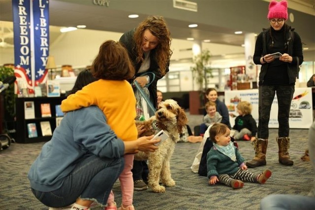 Puppies & Pi(e) wags the tail of story time participants