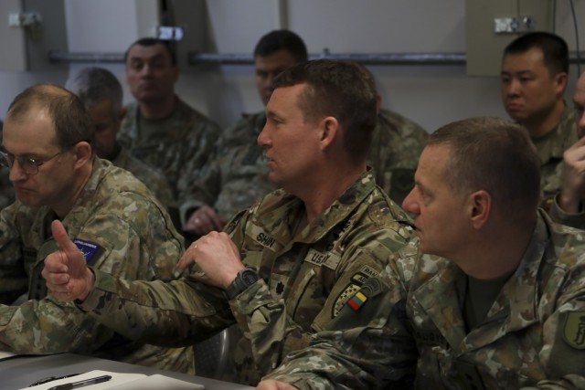 U.S. Army Lt. Col. Travis Shan, Commander of the 3rd Squadron, 4th Security Forces Assistance Brigade (SFAB), briefs Lithuanian Brig. Gen. Arturas Radvilas, Commander of the Lithuanian Land Forces, on the unit’s completed and uncompleted tasks during the Joint Multinational Simulation Center hosted, Allied Spirit 23 Command Post Exercise 1 for U.S. forces and multinational partners on March 8, 2023 on Camp Aachen at the Grafenwoehr Training Area, Germany. The Allied Spirit 23 CPX 1 is a command post exercise for V Corps with participation of two multinational division elements, the Polish 12th Mechanized Division and Lithuanian Mission Command Element, in preparation for the corps’ Warfighter Exercise (WFX).