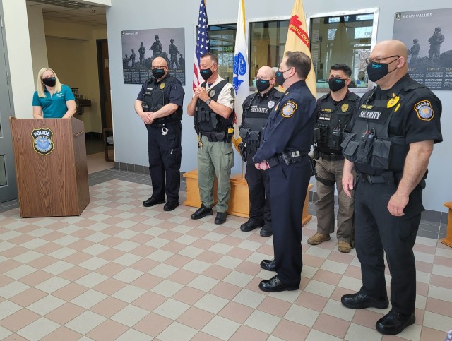 Garrison Victim Advocate Amber Holdford thanks APG police officers and security personnel from the Directorate of Operations for supporting the Sexual Harassment/Assault Response and Prevention progra
