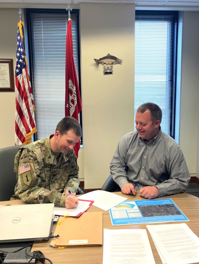 Col. Rayfield signs partnership agreement