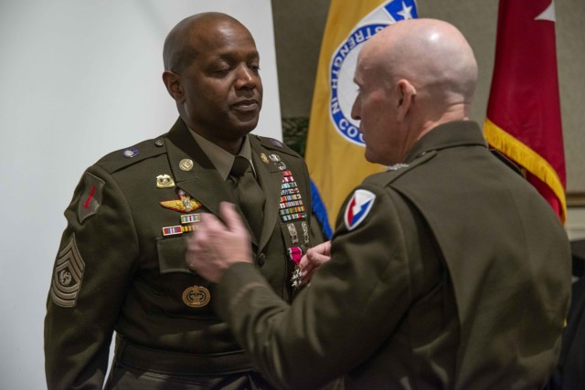 (From right) Maj. Gen. (Retired) Rodney D. Fogg, former Army Materiel Command deputy chief of staff, G3, hosted the retirement ceremony of Former USASAC Command Sgt. Maj. Sean Rice.  Rice retired March 17 with 35 years of service.