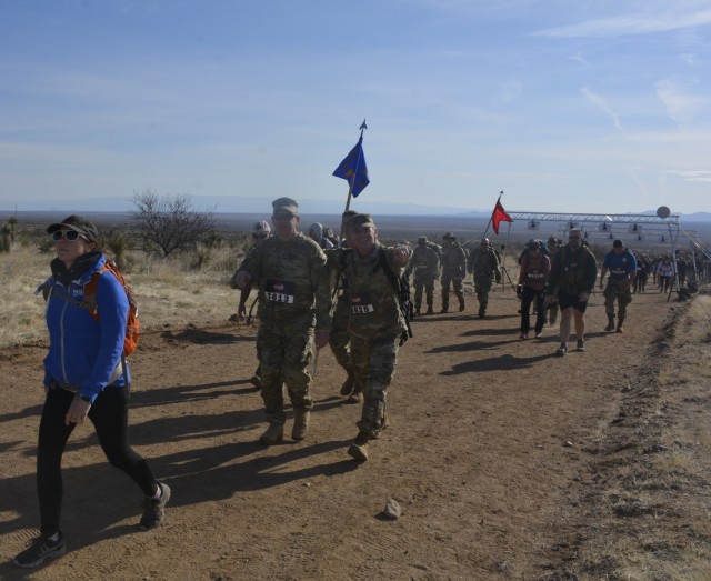 WSMR Commander Brig. Gen. Eric Little, center right, at the eight-mile mark.