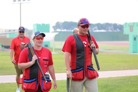 Staff Sgt. Will Hinton and Sgt. Alicia Gough won the Gold Medal in the Trap Mixed Team event at the International Shooting Sports Federation Shotgun World Cup in Doha, Qatar March 4-13. Hinton and Gough, who are both marksmanship instructors/competitive shooters with the U.S. Army Marksmanship Unit out of Fort Benning, Georgia, traveled to Qatar as part of USA Shooting’s National Shotgun Team.

The pair of U.S. Army Soldiers beat out Kuwait’s team to win the Gold Medal in the Final, bringing home another medal for the United States. Hinton, a Dacula, Georgia native, also shot a perfect, no-miss series of 90 hits during the all the qualification relays and the Final, something he has never done before in international competition. Gough is a native of Burlington, Wisconsin.  (ISSF Courtesy photo)