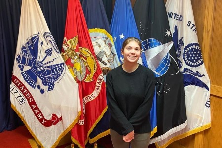 Pvt. Gracie Schuffert poses for a picture after taking the oath of enlistment on Feb. 10, 2023, at Harrisburg U.S. Military Entrance Processing Station in Mechanicsburg, Pa. Schuffert reported to basic training on March 20, 2023 with a follow-on training as a horizontal construction engineer.