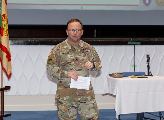 Col. Christopher L. Tomlinson, commander of U.S. Army Garrison Japan, provides remarks during a housing town hall at the newly renovated auditorium at Camp Zama, Japan, March 21, 2023.