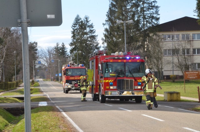 USAG Rheinland-Pfalz’s Fire Station 3 simulates responding to a national fire in building 1206 at the Miesau Ammunition Depot during the Mutual Aid Exercise March 18.