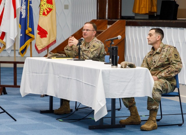 Col. Christopher L. Tomlinson, left, commander of U.S. Army Garrison Japan, and Command Sgt. Maj. David A. Rio, the garrison&#39;s senior enlisted leader, participate in a housing town hall at the newly renovated auditorium at Camp Zama, Japan, March 21, 2023. 