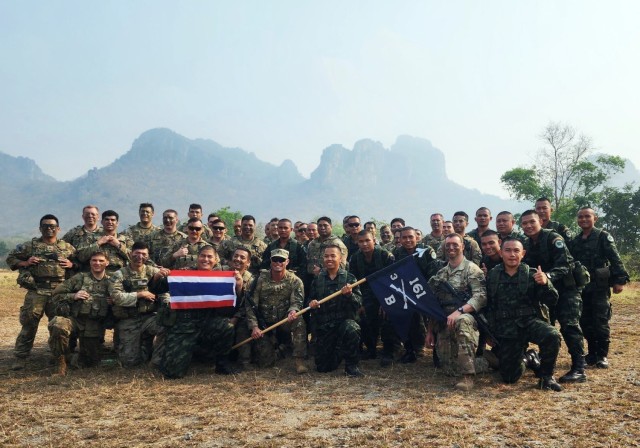 Washington National Guard Soldiers from Bear Company, 3rd Battalion, 161st Infantry Regiment, with their Royal Thai Army counterparts from 1st Battalion, 21st Mechanized Infantry Regiment, at the completion of training March 13, 2023, in the...