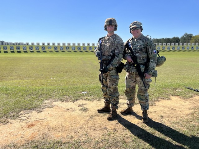 Col. Andrew Clark, commander, U.S. Army Security Assistance Training Management Organization out of Fort Bragg, N.C., and his son, Priv. 1st Class Quinlan Clark, an infantryman with Headquarters & Headquarters Company, 2-35 Infantry Brigade Combat Team, 25th Infantry Division out of Honolulu, Hawaii, competed and trained side by side at the 2023 U.S. Army Marksmanship Unit, an annual, live-fire marksmanship event hosted by the U.S. Army Marksmanship Unit at Fort Benning, Georgia. (Army photo by Michelle Lunato)