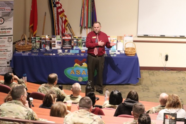 Terry Rogalla, Fort McCoy&#39;s suicide prevention program manager with the Directorate of Human Resources, talks about suicide prevention with Fort McCoy Garrison workforce members March 3, 2023, in the building 60 auditorium at Fort McCoy, Wis....
