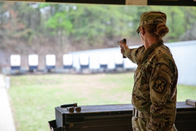 Cadet Jesse Mayer, with Texas A&M Reserve Officers&#39; Training Corps, competes in the Bullseye Pistol Match at the 2023 U.S. Army Small Arms Championships at Fort Benning, Georgia March 12-18.