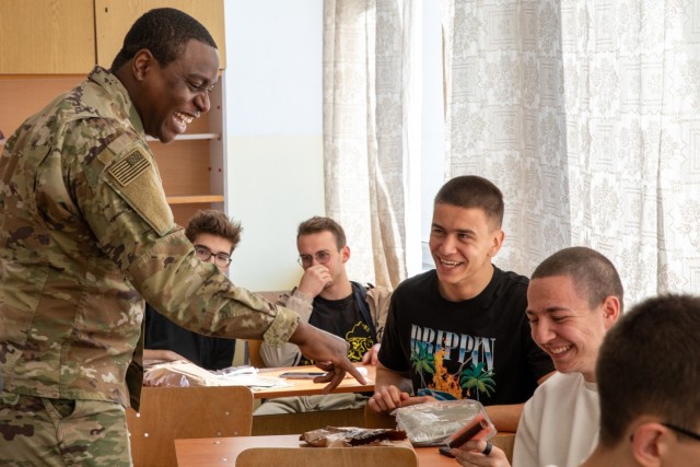 A Soldier interacts with Bulgarian Students
