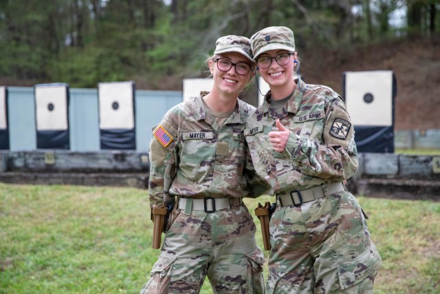 Cadets Hayle and Jesse Mayer, with Texas A&M Reserve Officers&#39; Training Corps, compete in the Bullseye Pistol Match at the 2023 U.S. Army Small Arms Championships at Fort Benning, Georgia March 12-18. 