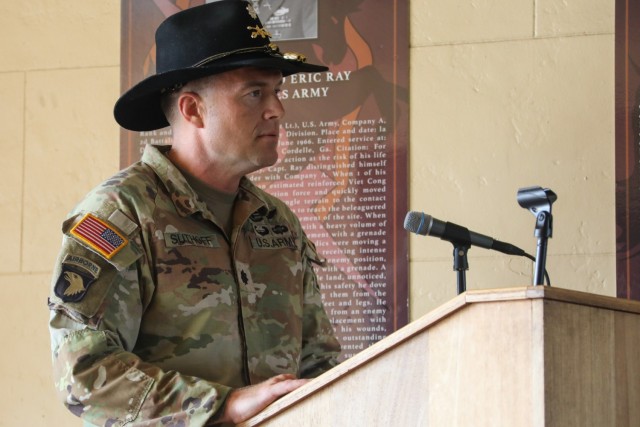 U.S. Army Lt. Col. Josh Suthoff, commander of 3rd Squadron, 4th Cavalry Regiment, 3rd Infantry Brigade Combat Team, 25th Infantry Division, delivers remarks to Medal of Honor Recipient Spc. 5 Dwight Birdwell during a ceremony on Schofield Barracks, Hawaii, March 22, 2023. Birdwell was awarded the Medal of Honor for his extraordinary display of heroism and selflessness while assigned to 3rd Squadron, 4th Cavalry Regiment, 25th Infantry Division while in Vietnam. (U.S. Army photo by Spc. Darbi Colson/3rd Infantry Brigade Combat Team)