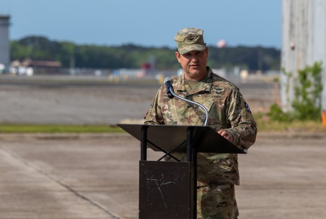 Col. Eric Vanek, commander of the 3rd Combat Aviation Brigade, 3rd Infantry Division, speaks during 3rd CAB’s color casing ceremony at Hunter Army Airfield, Georgia, March 23, 2023. 3rd CAB is preparing to support Atlantic Resolve, a nine-month rotation that provides rotational deployments of combat-credible forces to Europe to show our commitment to NATO while building readiness, increasing interoperability and enhancing the bonds between ally partner militaries. 