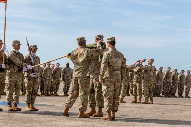Soldiers assigned to the 3rd Combat Aviation Brigade, 3rd Infantry Division, case the colors during their color casing ceremony at Hunter Army Airfield, Georgia, March 23, 2023. 3rd CAB is preparing to support Atlantic Resolve, a nine-month rotation that provides rotational deployments of combat-credible forces to Europe to show our commitment to NATO while building readiness, increasing interoperability and enhancing the bonds between ally partner militaries. 