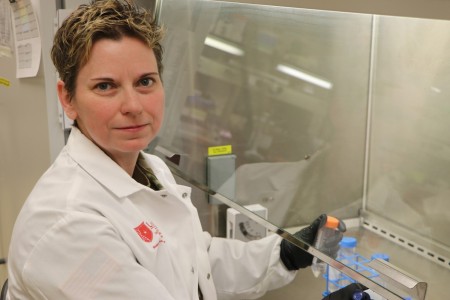 Capt. Sara Johnston works in a laboratory at U.S. Army Medical Research Institute of Infectious Diseases, Fort Detrick, Md. 