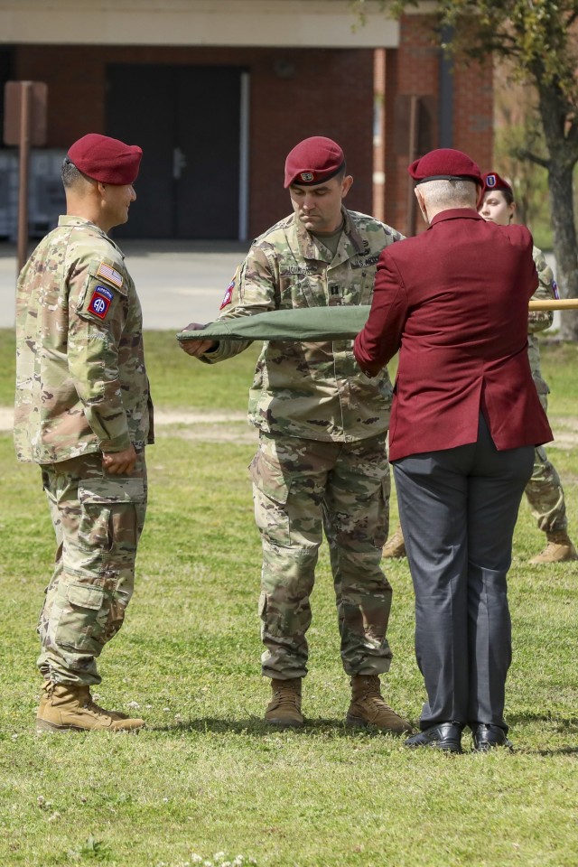 Capt. Adam Johnson, commander of Gainey Company, Headquarters and Headquarters Battalion, 82nd Airborne Division uncases the guidon during the uncasing ceremony of Gainey Company on Fort Bragg, N.C., March 29, 2023. The uncasing ceremony will...