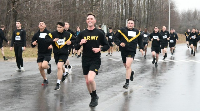 More than 750 Fort Drum community members participated in the inaugural Mountain Wellness 5K Run on April 6 outside Magrath Sports Complex. Representatives from the Fort Drum Soldier and Family Readiness Division teamed with Family and Morale, Welfare and Recreation to host the run in support of Mountain Wellness Month. The annual awareness campaign in April covers Child Abuse Prevention Month, Alcohol Awareness Month, Financial Literacy Month, Autism Awareness Month, and Sexual Assault Awareness and Prevention Month. (Photo by Mike Strasser, Fort Drum Garrison Public Affairs)