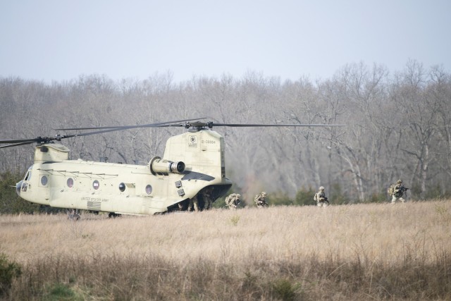 82nd Airborne Division Soldiers from Fort Bragg, North Carolina, perform an air assault mission Tuesday morning near Forney Airfield during the Operation Steel Box training exercise here this week. About 50 Soldiers from Fort Bragg participated in...