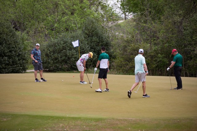 Golfers putt during the Ben Hogan Classic March 31 at the Courses of Clear Creek on Fort Hood, Texas. (U.S. Army photo by Blair Dupre, Fort Hood Public Affairs)