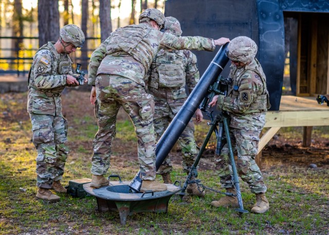 Indirect Fire Soldiers practice assembling an 81mm mortar tube