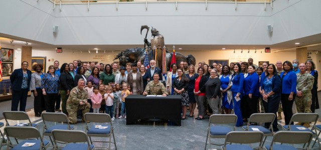 Lt. Gen. Sean Bernabe, III Armored Corps and Fort Hood commanding general, poses for a group photo with Fort Hood leadership, city leaders, representatives from Killeen Independent School District, Army Community Services and Child & Youth...