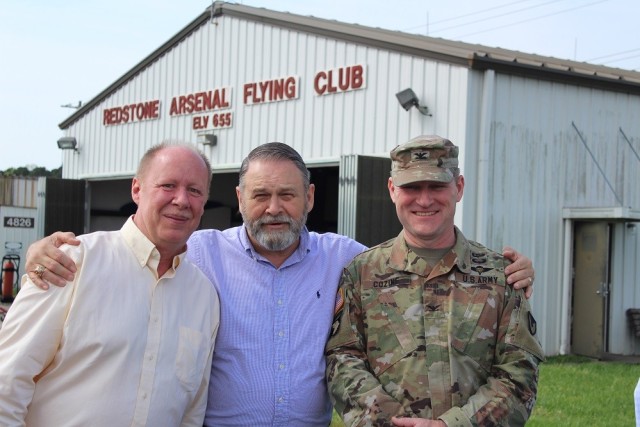 From left are Flying Activity Manager Tim Thompson, IMCOM-Sustainment Director Davis Tindoll and Garrison Commander Col. Brian Cozine. 