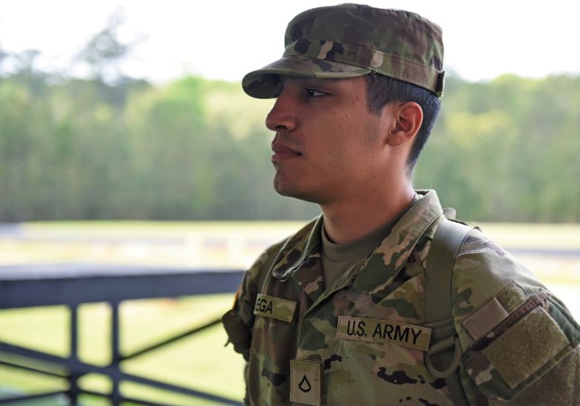 Pfc. Adam Vega poses for a photo after completing the Academic Skills Development Program at For Benning, Georgia, March 31. Vega improved his scores during the three-week course from 38 to 72, allowing him to renegotiate his contract and receive a $7,500 bonus. 