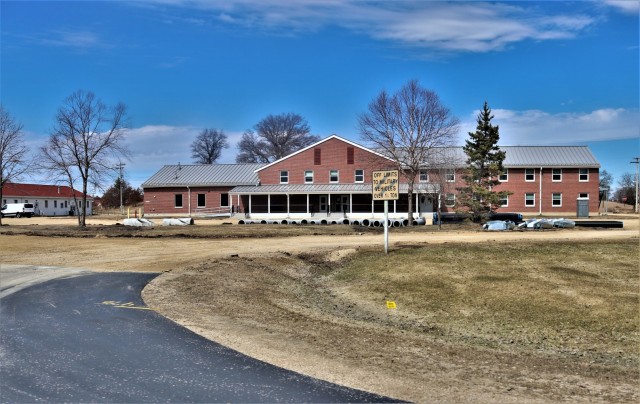 Work as part of an $850,000 grading project is shown April 3, 2023, on the cantonment area at Fort McCoy, Wis. An extensive grading project began in April 2023 around Fort McCoy’s building 2000 on the cantonment area to improve drainage in that...
