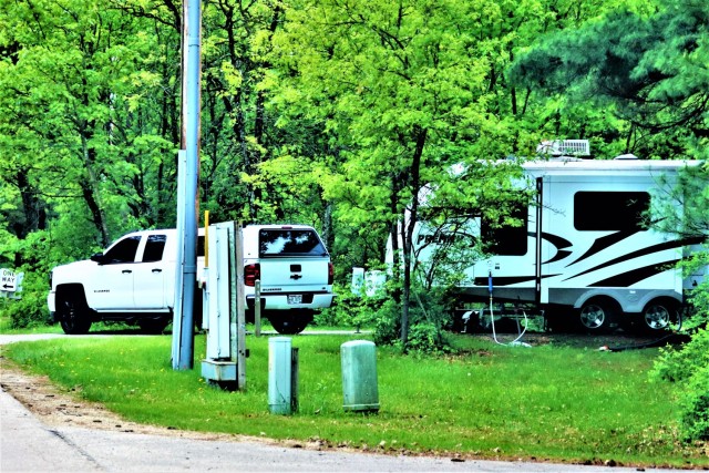A camper is set up at a campsite May 26, 2022, at Pine View Campground at Fort McCoy, Wis. Pine View Campground is part of Pine View Recreation Area. This area also includes Whitetail Ridge and Sportsman’s Range. The campground is nestled in a...