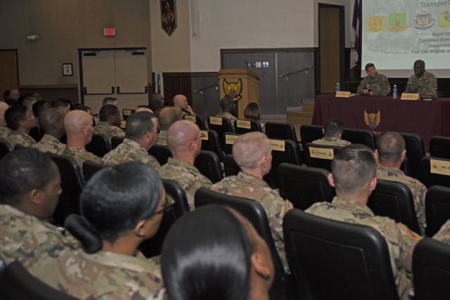Chief of Transportation, Col. Beth Behn (on stage, left), and Transportation Command Sgt. Maj. Randy Brown speak with NCOs from the 58th Transportation Battalion during an NCO symposium March 24 in Lincoln Hall Auditorium. Behn and Brown traveled...