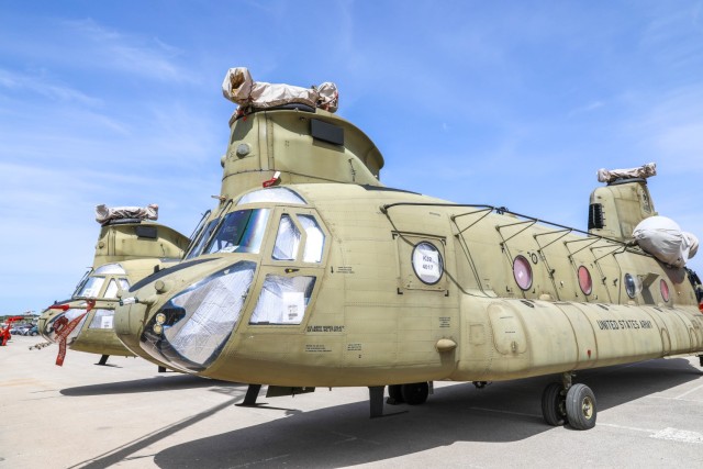 Two CH-47 Chinooks from 5th Battalion, 159th Aviation Regiment, 244th Expeditionary Combat Aviation Brigade, are staged before transport to a maintenance area and flown for Defender 23, at Naval Station Rota, Spain, April 6, 2023.