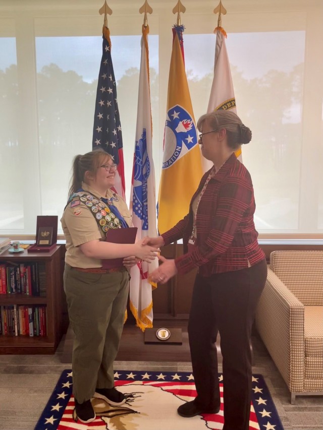 (Left) Angelina Billig, eldest daughter of USASAC G3/7 employee Joe Billig, was recognized April 14, 2023 by (right) Dr. Myra S. Gray, USASAC&#39;s Deputy to the Commanding General. Angelina recently attained the rank of Eagle Scout. She is one of only three women in Alabama to do so. Angelina was recognized by Gray for breaking down boundaries and shining a light on a path for others to follow. Becoming an Eagle Scout is a culmination of hard work and dedication. As her final project, Angelina established a new trail on Chapman Mountain with the Alabama Land Trust, and learned important lessons regarding project management. She was elected to the Order of the Arrow and showcased her outstanding leadership through selection as part of the first class of women to attend a National Youth Leadership Training. She will graduate high school later this year.